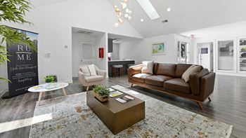 a living room with a couch and a coffee table
